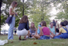 Several freshman ladies enjoy each other's company at a picnic lunch during New Student Orientation. - Photo by Kasey Carty-Campbell