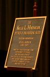 A plaque was presented during the memorial service for Kyle L. Hathcox, university professor and chair of physics and the associate dean of the college of arts and sciences, by naming the physics and engineering suite in honor of him. - Photo by Stephanie Schroeder