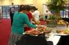 Kayla Powell and other students enjoyed refreshments made by Chef Greg at the President's Reception in Coburn. - Photo by Stephanie Schroeder