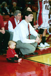 Head Coach Mark Campbell and his son Gray watch the final seconds of the Homecoming win against Blue Mountain. - Photo by Jim Veneman