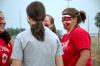 Sophomore Psychology Major April McCulley laughs with friends as they paint faces before a Lady Bulldog soccer match. - Photo by Matt Elia