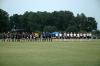 The Lady Bulldog soccer team (right) stands with the Bethel College team (left) during the national anthem. - Photo by Matt Elia