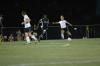 Junior Caitlin Zimmerman, pre-physical therapy major, passes the ball past the Belthel defender. - Photo by Matt Elia