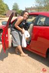 Amber-Rose Hawkins, a nursing major from Nashville, unloads her car during Freshmen Move-In Day. - Photo by Kathleen Murray