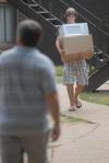 Caleb Hollingsworth moves into his room during Freshman Move-in Day. - Photo by Kathleen Murray