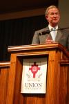Stephen Reynolds, president and CEO of Baptist Memorial Health Care of Memphis, presents a check for $1 million to Union's health care programs at the beginning of a chapel service.  - Photo by Stephanie Schroeder