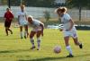 Brooke Walker dribbles down the field as teammates Caitlin Zimmerman and Korie Elrod follow behind. - Photo by Steven Aldridge