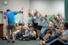 Andrew Courtner and other Focus leaders hosted the Open Mic night and start the party with a few rounds of the Wave. - Photo by Neisha Fuson