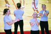 Union Cheerleaders getting ready prior to Union's homecoming game.
 - Photo by Justin Veneman