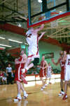 Sophomore Michael Palmer (42) elevates for two in 66-51 win over Hannabal-LaGrange during Homecoming 2003. - Photo by Justin Veneman