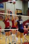 Juniors Emilie Ogas (left) and Brisa Berlin jump to block the volleyball from Trevecca Nazarene University's attack.  - Photo by Neisha Fuson