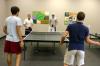 Jacob Hodge and David Hollsinger, back center, play intramural ping pong for SAE against Preston Davis and Ryan Davis. - Photo by Stephanie Schroeder