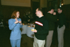 Members of the Class of '93 catch up on old times at their 10-year Reunion held at the Carnegie Library downtown during Homecoming 2003.  Pictured from left to right are Angie (Baker) Nichols, Joel Morgan, Chris Blair, and David Pickett. - Photo by Jim Veneman