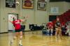 Junior Tiven Catrett serves the volleyball in a game against Mid-Continent University.  - Photo by Neisha Fuson
