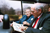 Dr. Doyle & Bettye Alexander ('50 & '56) of Nagcodoches, Tex. poured over their yearbooks while taking a driving tour of the old Union campus during Homecoming 2003. - Photo by Jim Veneman