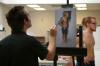Guest Artist Steve Forester paints a full-figure oil painting of Mark Inman for an all day art workshop. - Photo by Stephanie Schroeder