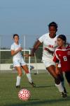 Freshman Eboni Murphy attempts to gain possession  of the ball during a game against Lyon College.  - Photo by Neisha Fuson