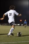 Freshman Edmundo Novarro prepares to kick the ball down field in hopes of setting up a Union shot against Belhaven College.  - Photo by Neisha Fuson