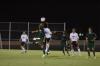 Union freshman Edmundo Novarro jumps with a Belhaven player as they battle for possession of the ball. - Photo by Neisha Fuson