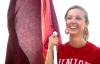 Freshman Juliana Robbins, public relations/advertising major, gets ready to charge into a Union soccer game waving a flag. - Photo by Matthew Diggs