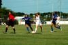 Sophomore Cara Pasley dribbles the ball upfield between two University of Alabama-Huntsville opponents. - Photo by Matt Elia