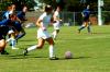 Sophomore Katelin Dirksen drives past a defender. - Photo by Matt Elia