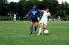 Sophomore Nikki Burau protects the ball from a defender. - Photo by Matt Elia