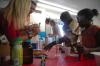 Union students share their time and knowledge of chemistry with some children at a Boys and Girls Club.  - Photo by Neisha Fuson
