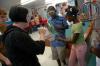 Michelle Thornhill shows the secrets of her physics demonstration at a Boys and Girls Club.  - Photo by Neisha Fuson
