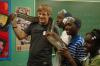 Dustin Scott shows off a snake for the children at a Boys and Girls Club meeting.  - Photo by Neisha Fuson