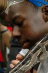 Some children of a Boys and Girls Club were extremely brave and wanted to actually hold a snake at a biology demonstration given by Union. - Photo by Neisha Fuson