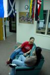 Senior Jasmine Huang laughs with M.A.I.S. Student Ariane Mansur in the international student lounge.  - Photo by Neisha Fuson
