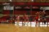 Junior Amanda Hutchison Coyle hits the ball over the net in a match versus Martin Methodist College (Tenn.). - Photo by Stephanie Schroeder