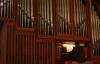 Ron Boud, professor of music, plays the organ for a chapel service. - Photo by Stephanie Schroeder