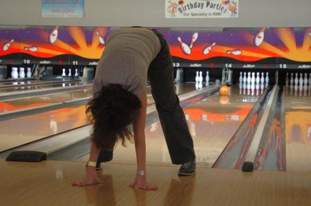 Strange techniques were used to knock down pins at the bowling night during Family Weekend. 