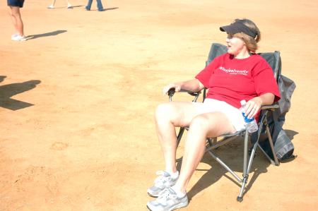 A Union mom watches as her daughter battles in an intramural flag football game. 