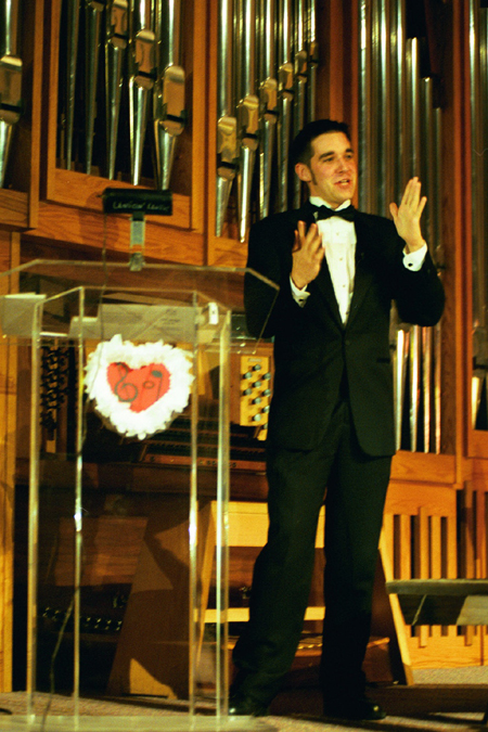 Sophomore Brennan Uthe was this year's emcee at All-Sing during Homecoming 2003.