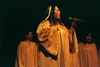 SAC member Melissa Gruver takes the lead at All-Sing during Homecoming 2003. - Photo by Lindsay Stavish