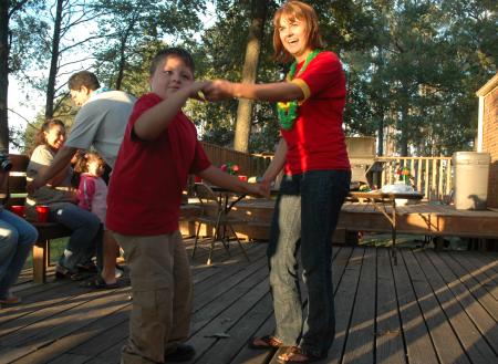 Armando and Lyndsey Sparks dance at his Make-A-Wish Foundation party. 