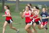 Candace Cross and Charlie Moss lead early in the Union Cross Country Invitational.  Union captured the race title. - Photo by Tommy Sadler