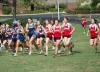 Runners sprint from the starting line in the Union Cross Country Invitational.  Union captured the race title. - Photo by Tommy Sadler
