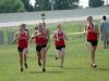 Lydia Bond leads the Union team during the Union Cross Country Invitational.  Bond won the individual title and helped Union to the team title. - Photo by Tommy Sadler