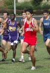 Phillip Thompson tries to separate himself from the rest of the pack in the Union Cross Country Invitational.  Thompson finished fourth and the Union team finished first. - Photo by Tommy Sadler