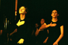 Zeta Tau Alpha ladies mime at All-Sing during Homecoming 2003. - Photo by Lindsay Stavish