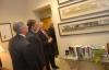 President Dockery shows Leon Panetta and Andrew Card photos from Union's previous campus. - Photo by Morris Abernathy