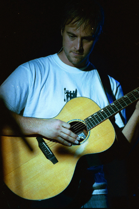 Bebo takes a moment during the coffeehouse concert.