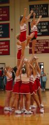 The Union cheerleaders form a stunt during the halftime show of the Homecoming game.  - Photo by Neisha Fuson