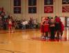 The Lady Bulldogs officially end the game with a team prayer in the center of the court.  - Photo by Neisha Fuson