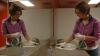 Senior Stephnie Lantz cleans in one of the bathrooms at J-Crib Ministries as part of her service on this year's Day of Remembrance.  - Photo by Neisha Fuson