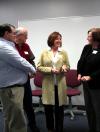 John Gross, Ken Newman, Michelle Atkins and Ann Singleton laugh and talk about what is going on in the School of Education. - Photo by Kristi McMurry